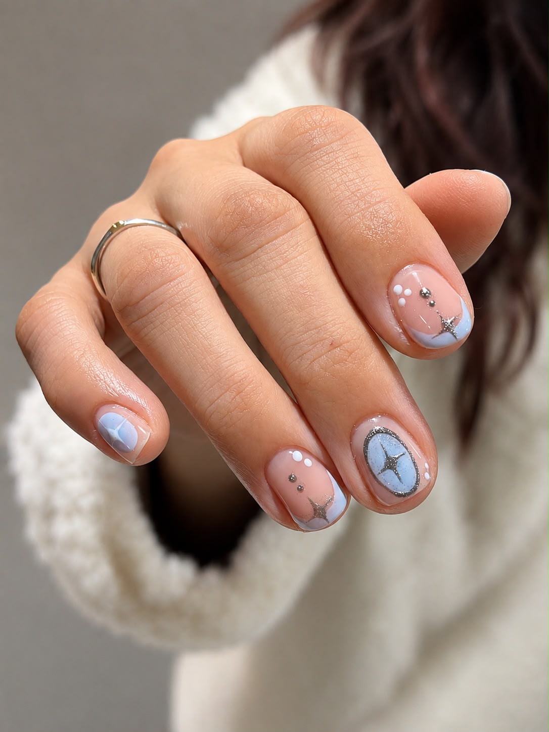 Semipermanente celeste con diseños